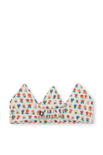 תמונה אחורית של כתר לבן עם הדפס פרחוני