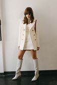 תמונת אווירה של Joseph Roll Neck Silk Stretch in Ivory