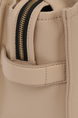 תמונת תקריב של The Leather Mini Traveler Tote Bag in Light Beige