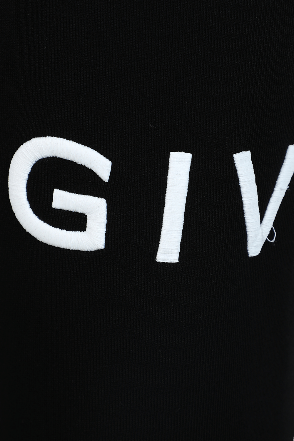 תמונת פנים של מכנסי סלים ג'וג שחורים עם לוגו GIVENCHY