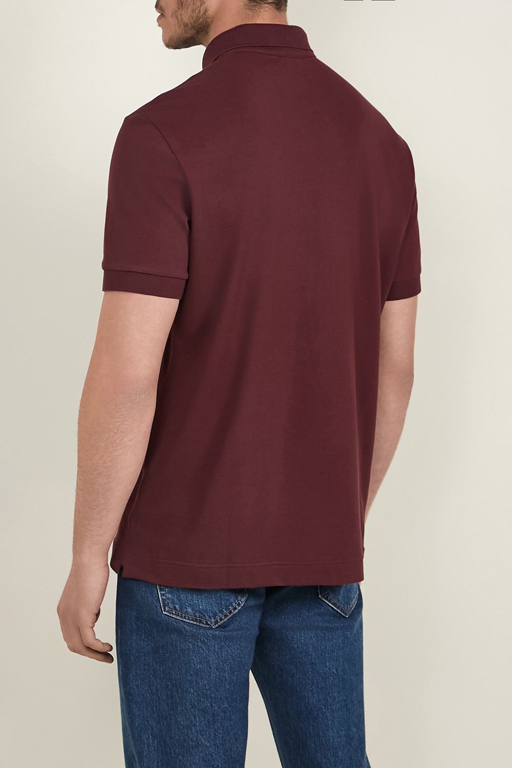 תמונת דוגמן אחורית של חולצת פולו LACOSTE