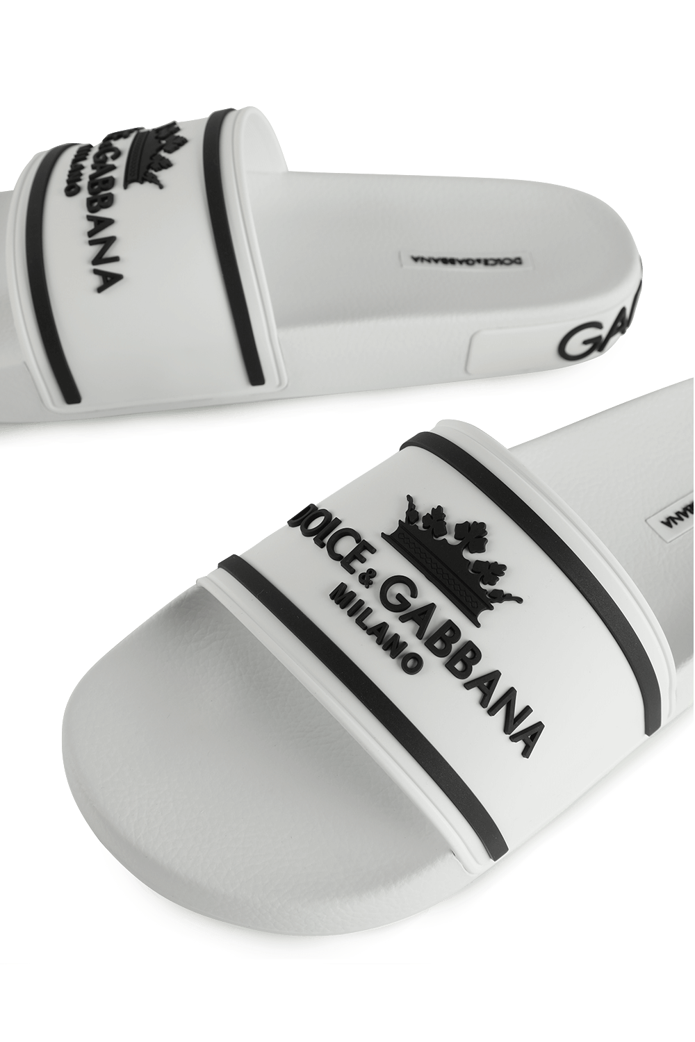 תמונת תקריב של Crown Logo Slides in White and Black
