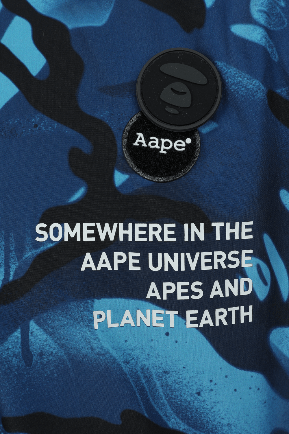 תמונת פנים של Camouflage Puffer Coat in Blue AAPE