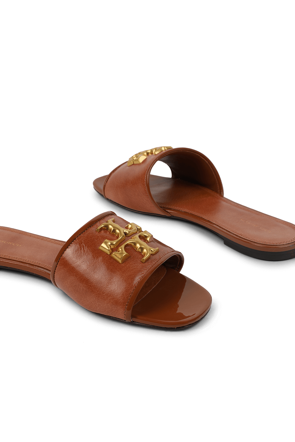 תמונת תקריב של כפכפי סליידס מעור TORY BURCH