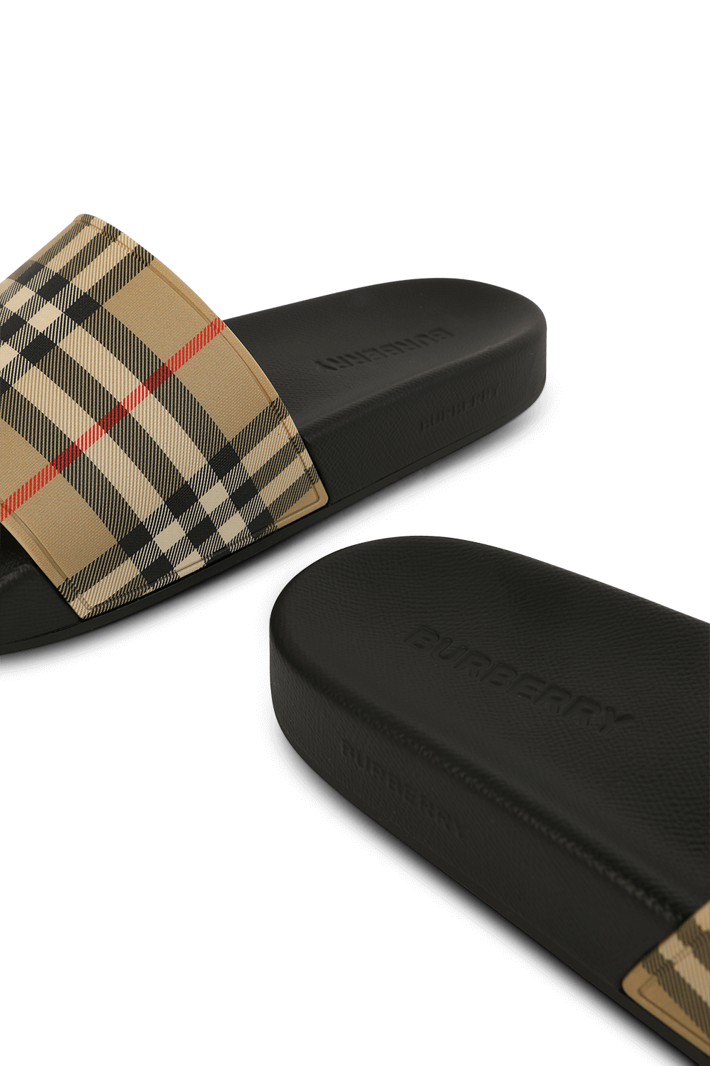 תמונת תקריב של כפכפי סליידס בהדפס משובץ BURBERRY