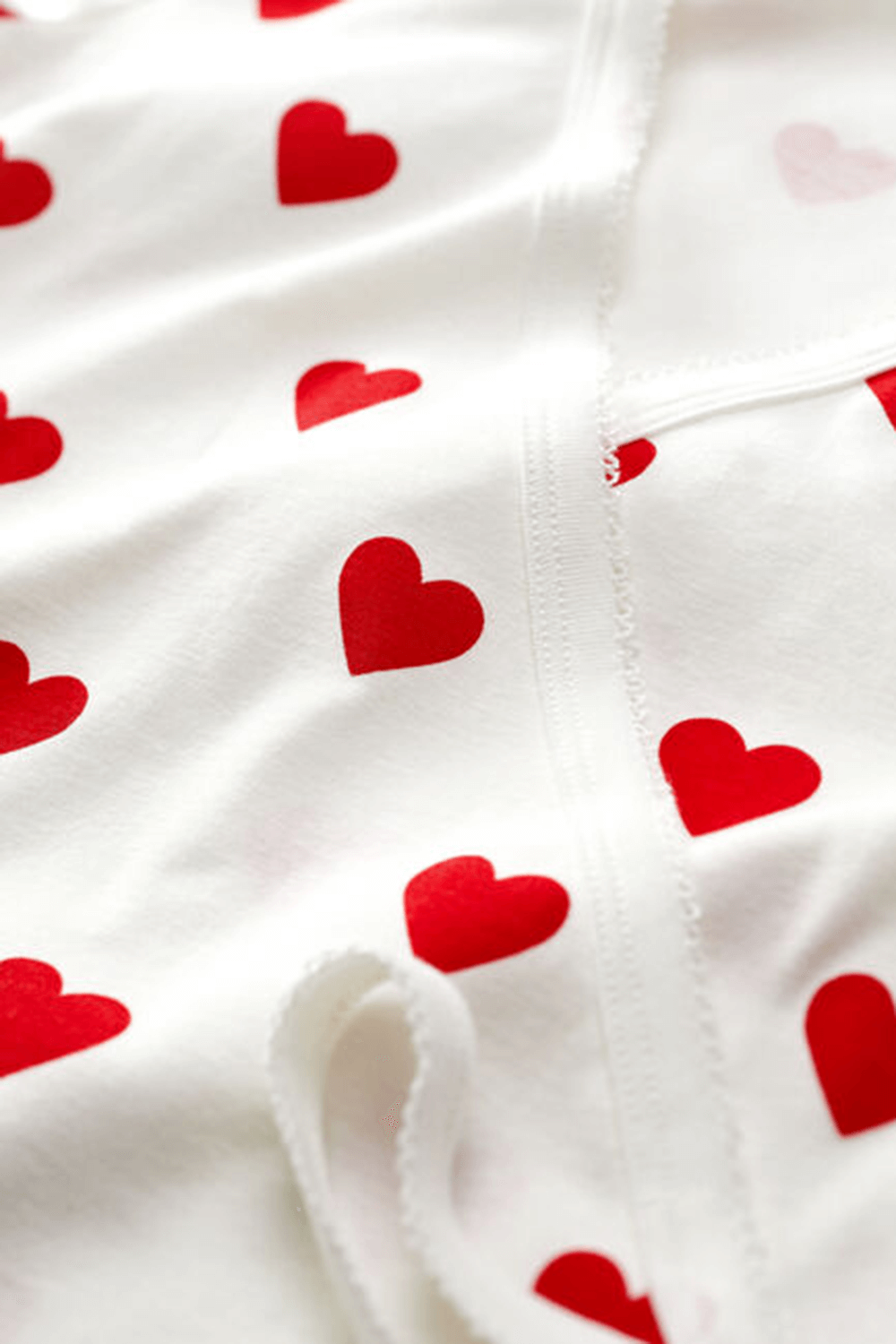תמונת תקריב של קרדיגן מעטפה מכותנה אורגנית PETIT BATEAU