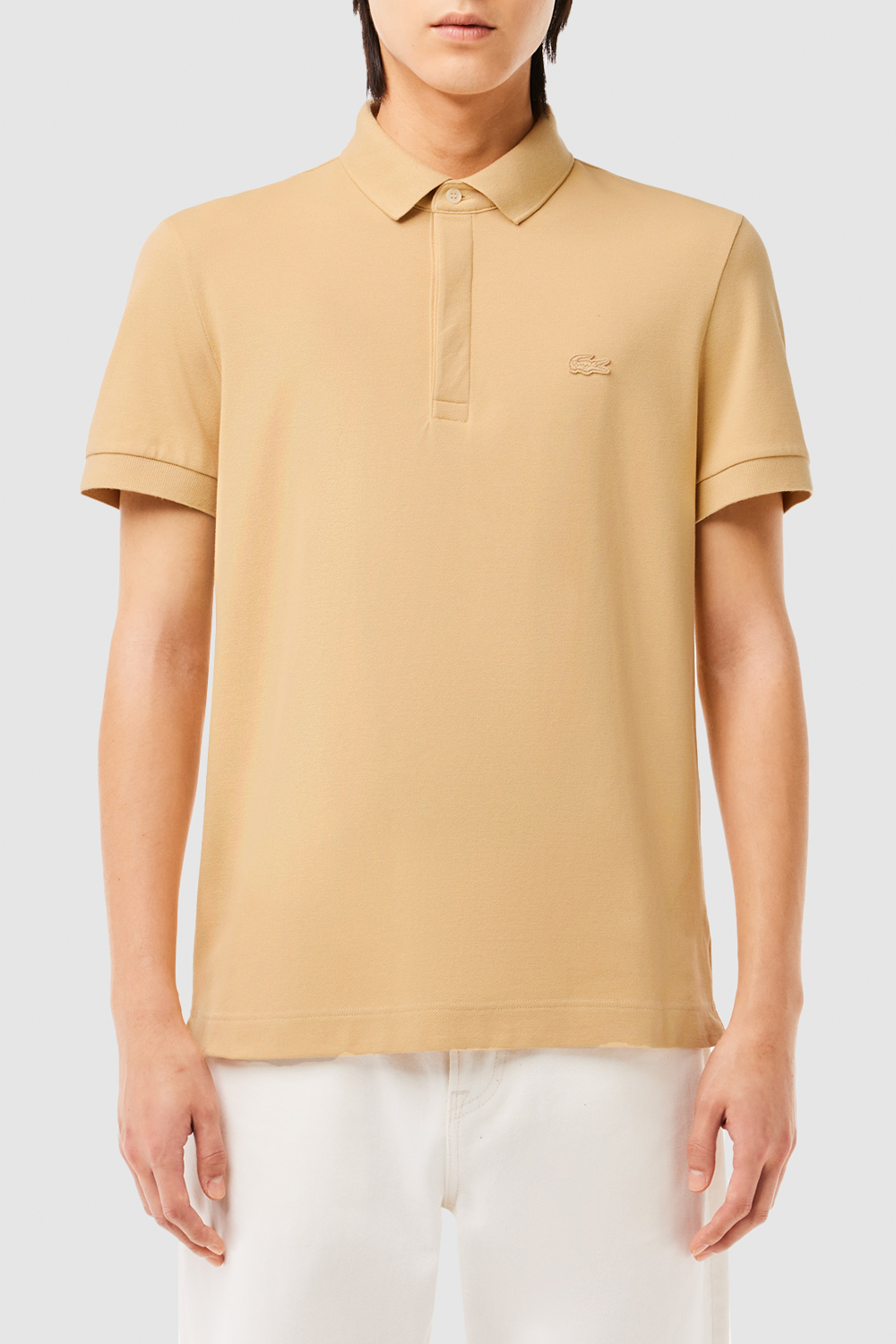 תמונת דוגמן קידמית של חולצת פולו LACOSTE